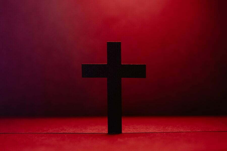 black cross on red textile