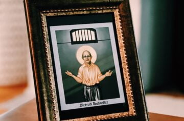 a picture of a man in a picture frame on a table