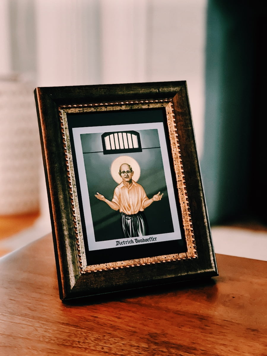 a picture of a man in a picture frame on a table