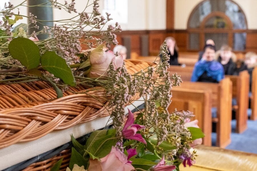 a bunch of flowers that are in a basket