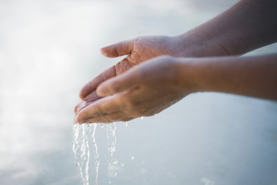 a close-up of hands shaking