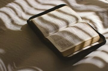 a black book on a bed